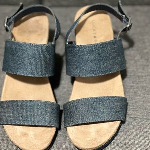 Lucky Brand Kenisha Denim Wedge Sandal, Size 6.5, Color Blue, Heel: 3”. (Used)